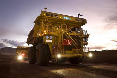 Remotely controlled tipper trucks operate at a Rio Tinto iron ore mine in Western Australia in this undated handout picture made available M Remotely controlled tipper trucks operate at a Rio Tinto iron ore mine in Western Australia in this undated handout picture made available M