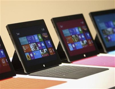 New Surface tablet computers with keyboards are displayed at its unveiling by Microsoft in Los Angeles, California, June 18, 2012. REUTERS/D New Surface tablet computers with keyboards are displayed at its unveiling by Microsoft in Los Angeles, California, June 18, 2012. REUTERS/D