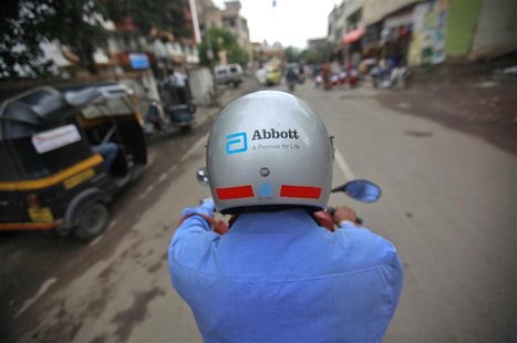 A representative for Abbott rides his bike to a doctor's clinic in Pune August 27, 2012. Picture taken August 27, 2012. REUTERS/Danish Siddi A representative for Abbott rides his bike to a doctor's clinic in Pune August 27, 2012. Picture taken August 27, 2012. REUTERS/Danish Siddi