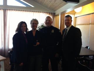 Kleinschmidt (2nd from left) with her award Kleinschmidt (2nd from left) with her award