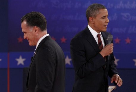 Republican presidential nominee Mitt Romney (L) listens to U.S. President Barack Obama during the second U.S. presidential campaign debate i Republican presidential nominee Mitt Romney (L) listens to U.S. President Barack Obama during the second U.S. presidential campaign debate i