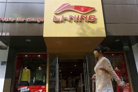 A woman walks past a Li Ning sportswear store in Huaibei, Anhui province October 17, 2012. REUTERS/China Daily A woman walks past a Li Ning sportswear store in Huaibei, Anhui province October 17, 2012. REUTERS/China Daily
