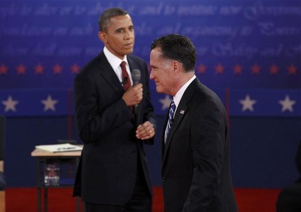 U.S. President Barack Obama (L) looks over at Republican presidential nominee Mitt Romney during the second U.S. presidential campaign debat U.S. President Barack Obama (L) looks over at Republican presidential nominee Mitt Romney during the second U.S. presidential campaign debat