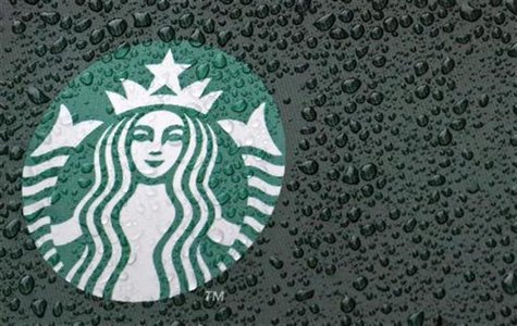 Raindrops are seen on the Starbucks logo on a signage at a branch of the coffee shop chain in London October 8, 2012. REUTERS/Luke Macgregor Raindrops are seen on the Starbucks logo on a signage at a branch of the coffee shop chain in London October 8, 2012. REUTERS/Luke Macgregor