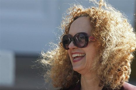 Carolyn Christov-Bakargiev (R), "dOCUMENTA (13)" art exhibition director smiles during dOCUMENTA's official opening in Kassel, June 9, 2012. Carolyn Christov-Bakargiev (R), "dOCUMENTA (13)" art exhibition director smiles during dOCUMENTA's official opening in Kassel, June 9, 2012.