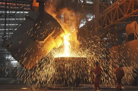 Labourers work at a steel factory in Dalian, Liaoning province July 13, 2012. REUTERS/China Daily Labourers work at a steel factory in Dalian, Liaoning province July 13, 2012. REUTERS/China Daily