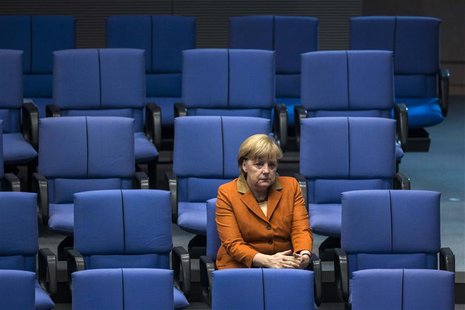 German Chancellor Angela Merkel attends a debate after delivering a government policy statement during a session of the Bundestag, the Germa German Chancellor Angela Merkel attends a debate after delivering a government policy statement during a session of the Bundestag, the Germa