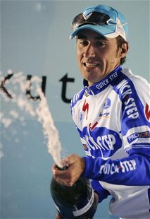 Spanish team Quickstep rider Carlos Barredo celebrates winning the San Sebastian Classic one day cycle race in San Sebastian August 1, 2009. Spanish team Quickstep rider Carlos Barredo celebrates winning the San Sebastian Classic one day cycle race in San Sebastian August 1, 2009.