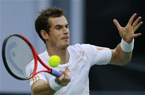 Andy Murray of Britain hits a return to Radek Stepanek of the Czech Republic during their men's singles quarterfinals tennis match at the Sh Andy Murray of Britain hits a return to Radek Stepanek of the Czech Republic during their men's singles quarterfinals tennis match at the Sh