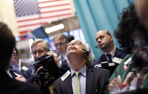 Traders work on the floor of the New York Stock Exchange, October 19, 2012. REUTERS/Brendan McDermid Traders work on the floor of the New York Stock Exchange, October 19, 2012. REUTERS/Brendan McDermid