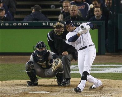 Detroit Tigers' SS Jhonny Peralta connects for a solo home run in the eighth inning against the New York Yankees during Game 4 of their MLB ALCS baseball playoff series in Detroit, Michigan, October 18, 2012.
REUTERS/Mark Blinch Detroit Tigers' SS Jhonny Peralta connects for a solo home run in the eighth inning against the New York Yankees during Game 4 of their MLB ALCS baseball playoff series in Detroit, Michigan, October 18, 2012.
REUTERS/Mark Blinch