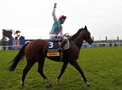 Tom Quealy on Frankel celebrates after winning The Champion Stakes during the British Champions Day at Ascot racecourse in southern England Tom Quealy on Frankel celebrates after winning The Champion Stakes during the British Champions Day at Ascot racecourse in southern England