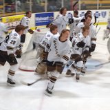 Western Michigan Broncos hockey team skates back to the bench following their warm up session.