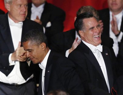 U.S. President Barack Obama and Republican presidential candidate Mitt Romney (R) are pictured on stage at the 67th Annual Alfred E. Smith M U.S. President Barack Obama and Republican presidential candidate Mitt Romney (R) are pictured on stage at the 67th Annual Alfred E. Smith M