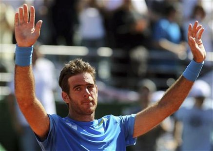 Juan Martin Del Potro of Argentina reacts after winning his Davis Cup World Group match against Radek Stepanek of Czech Republic in Buenos A Juan Martin Del Potro of Argentina reacts after winning his Davis Cup World Group match against Radek Stepanek of Czech Republic in Buenos A