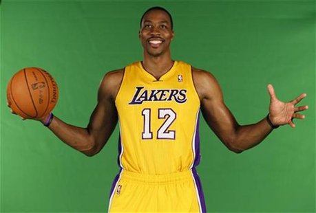 New center Dwight Howard poses for photos during NBA media day for the Los Angeles Lakers basketball team in Los Angeles October 1, 2012. RE New center Dwight Howard poses for photos during NBA media day for the Los Angeles Lakers basketball team in Los Angeles October 1, 2012. RE