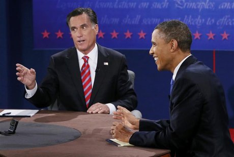 U.S. President Barack Obama (R) laughs as Republican presidential nominee Mitt Romney speaks during the final U.S. presidential debate in Bo U.S. President Barack Obama (R) laughs as Republican presidential nominee Mitt Romney speaks during the final U.S. presidential debate in Bo