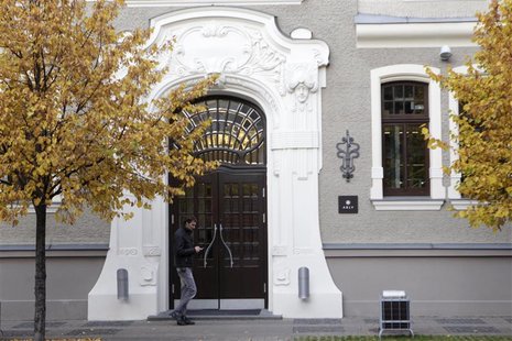 People walk past an ABLV Bank office in Riga October 23, 2012. REUTERS/Ints Kalnins People walk past an ABLV Bank office in Riga October 23, 2012. REUTERS/Ints Kalnins
