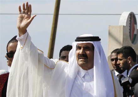 The Emir of Qatar Sheikh Hamad bin Khalifa al-Thani waves to the crowd upon his arrival at a cornerstone laying ceremony for a Qatari funded The Emir of Qatar Sheikh Hamad bin Khalifa al-Thani waves to the crowd upon his arrival at a cornerstone laying ceremony for a Qatari funded
