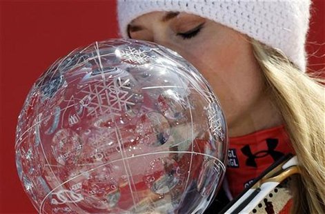 Lindsey Vonn from the U.S. kisses her trophy after winning the women's overall World Cup at the Alpine skiing World Cup finals in Schladming Lindsey Vonn from the U.S. kisses her trophy after winning the women's overall World Cup at the Alpine skiing World Cup finals in Schladming