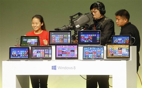 A student shares her experience of using Windows 8 as she speaks to the media during a Microsoft promotional event ahead of the launch of Wi A student shares her experience of using Windows 8 as she speaks to the media during a Microsoft promotional event ahead of the launch of Wi