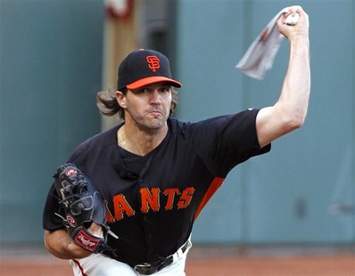 San Francisco Giants starting pitcher Barry Zito warms-up his arm with a towel during practice for the MLB World Series in San Francisco, Oc San Francisco Giants starting pitcher Barry Zito warms-up his arm with a towel during practice for the MLB World Series in San Francisco, Oc