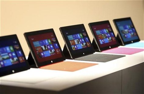 New Surface tablet computers by Microsoft are displayed at its unveiling in Los Angeles, California, June 18, 2012. REUTERS/David McNew New Surface tablet computers by Microsoft are displayed at its unveiling in Los Angeles, California, June 18, 2012. REUTERS/David McNew