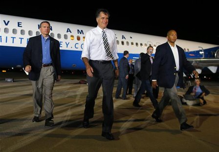 Republican presidential nominee Mitt Romney walks back to the crowd to shake more hands at the conclusion of a campaign rally in Cedar Rapid Republican presidential nominee Mitt Romney walks back to the crowd to shake more hands at the conclusion of a campaign rally in Cedar Rapid