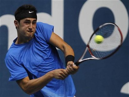 Austraria's Bernard Tomic returns a shot to France's Richard Gasquet during their men's singles quarter-final match at the Thailand Open 201 Austraria's Bernard Tomic returns a shot to France's Richard Gasquet during their men's singles quarter-final match at the Thailand Open 201