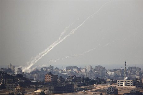 Trails of smoke are seen after the launch of rockets from the northern Gaza strip towards Israel October 24, 2012. REUTERS/Amir Cohen Trails of smoke are seen after the launch of rockets from the northern Gaza strip towards Israel October 24, 2012. REUTERS/Amir Cohen