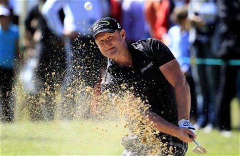 Jamie Donaldson of Wales hits out of a bunker onto the 15th green during the final round of the European Masters golf tournament in the Swis Jamie Donaldson of Wales hits out of a bunker onto the 15th green during the final round of the European Masters golf tournament in the Swis