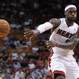 Miami Heat's LeBron James passes against the Detroit Pistons in a preseason NBA basketball game at the Miami Heat's home arena in Miami, Flo Miami Heat's LeBron James passes against the Detroit Pistons in a preseason NBA basketball game at the Miami Heat's home arena in Miami, Flo