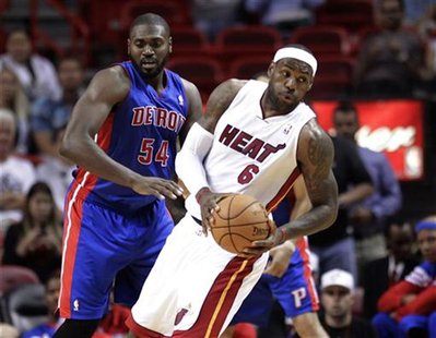 Detroit Pistons' Jason Maxiell (L) clashes with Miami Heat's LeBron James in a preseason NBA basketball game at the Miami Heat's home arena Detroit Pistons' Jason Maxiell (L) clashes with Miami Heat's LeBron James in a preseason NBA basketball game at the Miami Heat's home arena