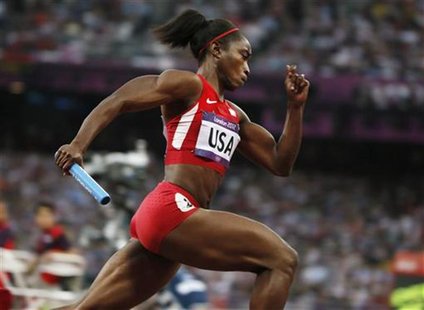 Tianna Madison of the U.S. competes in her women's 4x100m relay heat during the London 2012 Olympic Games at the Olympic Stadium August 9, 2 Tianna Madison of the U.S. competes in her women's 4x100m relay heat during the London 2012 Olympic Games at the Olympic Stadium August 9, 2