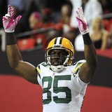 Green Bay Packers' wide receiver Greg Jennings celebrates a touchdown in the second half of their NFL football game against the Atlanta Falc Green Bay Packers' wide receiver Greg Jennings celebrates a touchdown in the second half of their NFL football game against the Atlanta Falc