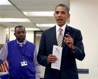 U.S. President Barack Obama holds his early voting ballot receipt after casting his vote at the Martin Luther King Community Center in Chicago, Illinois October 25, 2012.
REUTERS/Kevin Lamarque U.S. President Barack Obama holds his early voting ballot receipt after casting his vote at the Martin Luther King Community Center in Chicago, Illinois October 25, 2012.
REUTERS/Kevin Lamarque