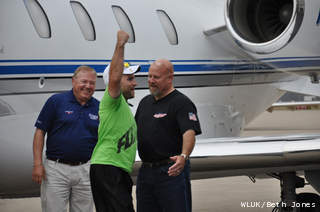 Spc. Justin Lane celebrates his arrival at Austin Straubel Airport on Wednesday, October 24, 2012. (courtesy of FOX 11). Spc. Justin Lane celebrates his arrival at Austin Straubel Airport on Wednesday, October 24, 2012. (courtesy of FOX 11).