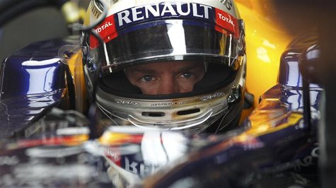 Red Bull Formula One driver Sebastian Vettel of Germany sits in his car during the first practice session of the Indian F1 Grand Prix at the Red Bull Formula One driver Sebastian Vettel of Germany sits in his car during the first practice session of the Indian F1 Grand Prix at the