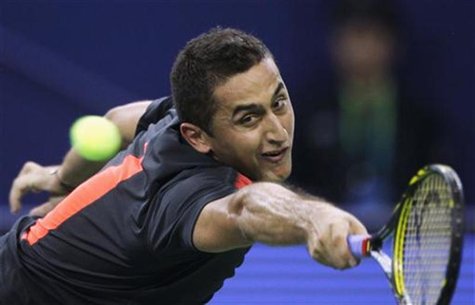 Nicolas Almagro of Spain hits a return during his single's tennis match against Tommy Haas of Germany at the Shanghai Masters tournament in Nicolas Almagro of Spain hits a return during his single's tennis match against Tommy Haas of Germany at the Shanghai Masters tournament in
