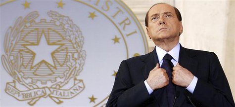 Then Italian Prime Minister Silvio Berlusconi looks on as he leads a news conference with French President Nicolas Sarkozy at Villa Madama i Then Italian Prime Minister Silvio Berlusconi looks on as he leads a news conference with French President Nicolas Sarkozy at Villa Madama i