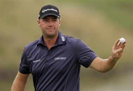 Peter Hanson of Sweden holds a ball on the third green during the BMW Masters 2012 golf tournament at Lake Malaren Golf Club in Shanghai, Oc Peter Hanson of Sweden holds a ball on the third green during the BMW Masters 2012 golf tournament at Lake Malaren Golf Club in Shanghai, Oc