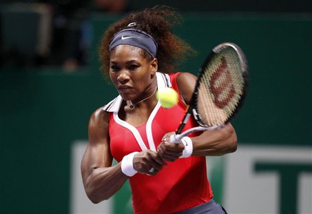 Serena Williams of the U.S. hits a return to Poland's Agnieszka Radwanska during their semifinals WTA tennis championships match in Istanbul Serena Williams of the U.S. hits a return to Poland's Agnieszka Radwanska during their semifinals WTA tennis championships match in Istanbul