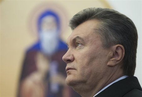 Ukrainian President Viktor Yanukovich attends a ceremony to mark the opening of a church on a military base in Kiev October 26, 2012. REUTER Ukrainian President Viktor Yanukovich attends a ceremony to mark the opening of a church on a military base in Kiev October 26, 2012. REUTER
