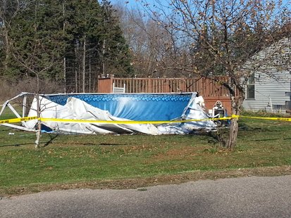 Above ground swimming pool damaged by a drunk driver in Amherst Junction 10/27/12. The driver also struck the house injuring a sleeping couple. Above ground swimming pool damaged by a drunk driver in Amherst Junction 10/27/12. The driver also struck the house injuring a sleeping couple.