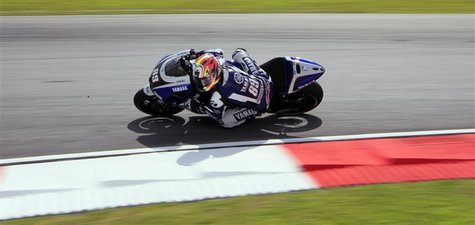 Yamaha MotoGP test rider Katsuyuki Nakasuga of Japan takes a corner during the first free practice session at the Malaysian Grand Prix at Se Yamaha MotoGP test rider Katsuyuki Nakasuga of Japan takes a corner during the first free practice session at the Malaysian Grand Prix at Se