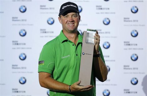 Peter Hanson of Sweden poses with his trophy after winning the BMW Masters 2012 golf tournament at Lake Malaren Golf Club in Shanghai, Octob Peter Hanson of Sweden poses with his trophy after winning the BMW Masters 2012 golf tournament at Lake Malaren Golf Club in Shanghai, Octob