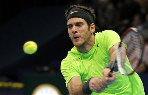 Argentina's Juan Martin del Potro returns the ball during his final match against Switzerland's Roger Federer at the Swiss Indoors ATP tenni Argentina's Juan Martin del Potro returns the ball during his final match against Switzerland's Roger Federer at the Swiss Indoors ATP tenni