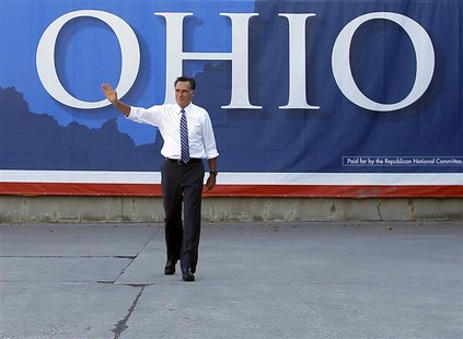 Republican presidential nominee Mitt Romney waves to the crowd at the conclusion of a campaign rally at Worthington Industries in Worthingto Republican presidential nominee Mitt Romney waves to the crowd at the conclusion of a campaign rally at Worthington Industries in Worthingto