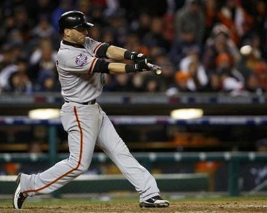 San Francisco Giants' Marco Scutaro hits an RBI single against the Detroit Tigers in the tenth inning during Game 4 of the MLB World Series baseball championship in Detroit, Michigan, October 28, 2012.
REUTERS/Mark Blinch San Francisco Giants' Marco Scutaro hits an RBI single against the Detroit Tigers in the tenth inning during Game 4 of the MLB World Series baseball championship in Detroit, Michigan, October 28, 2012.
REUTERS/Mark Blinch