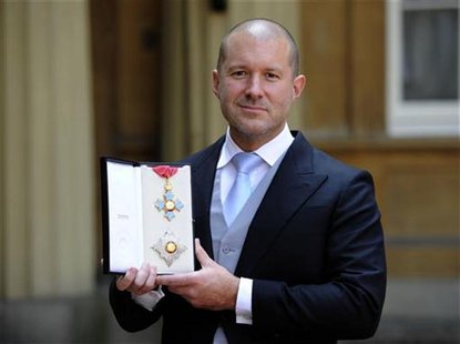 Jonathan Ive, senior vice president of industrial design at Apple Inc poses with his with his Knight Commander of the Order of the British E Jonathan Ive, senior vice president of industrial design at Apple Inc poses with his with his Knight Commander of the Order of the British E
